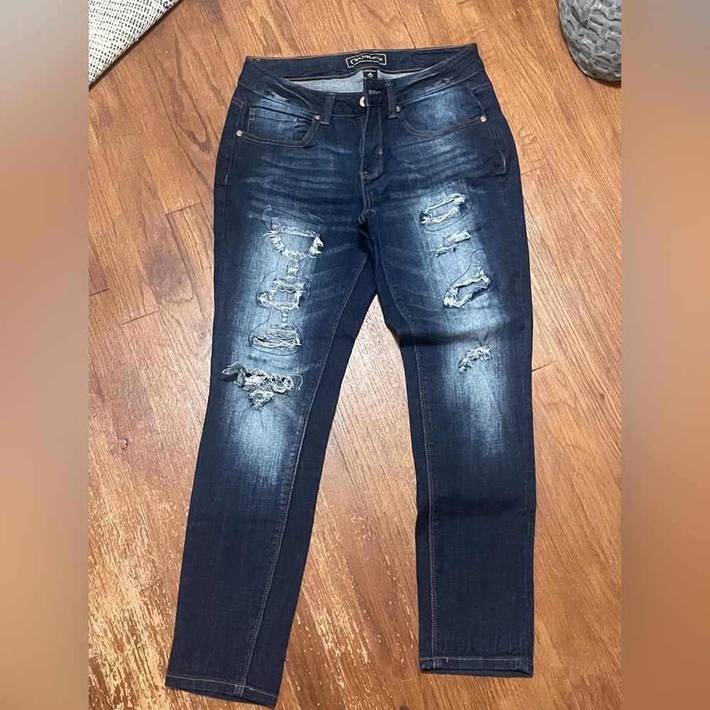 Distressed Dark Blue Jeans